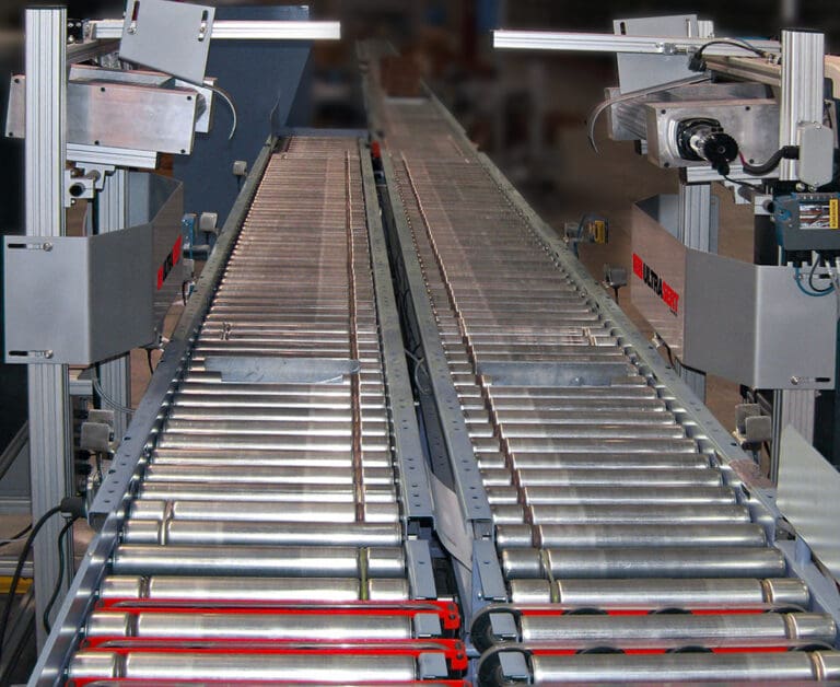 shipping conveyors with automated document inserters installed